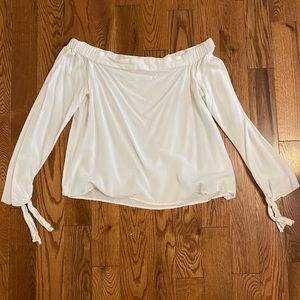Caren Forbes off shoulder shirt